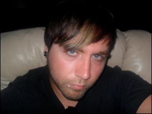 Matt McQuinn. McQuinn was one of the victims in the July 20, Aurora, Colo. movie theater shooting.