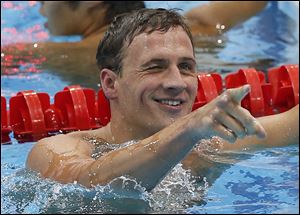 Ryan Lochte reacts after winning the 400-meter individual medley on Saturday night in 2012 Summer Olympics in London. Teammate Michael Phelps finished fourth.