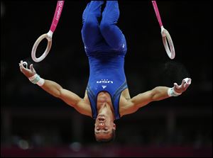 American Jacob Dalton, performing on the rings, is part of the U.S. squad that hopes to win team competition on Monday.