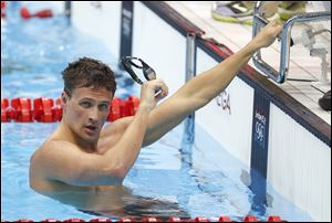 United States' Ryan Lochte reacts after his relay team's silver medal win in the men's 4x100-meter freestyle relay final men's relay at the Aquatics Centre in the Olympic Park during the 2012 Summer Olympics in London, Sunday.