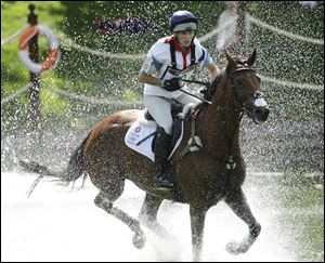 Zara Phillips of Great Britain rides High Kingdom as she competes in the equestrian eventing cross country phase at Greenwich Park, at the 2012 Summer Olympics.