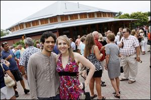 Josue and Sheila Fuetes pose at the Toledo Regional Chamber of Commerce Clam Bake at the Toledo Zoo Nairobi Pavilion.
