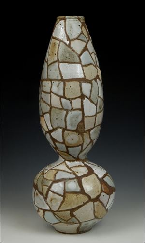 ‘White Terrane’ is one of the ceramic works by Timothy A. Wallace on view in the Library House Gallery in Grand Rapids, Ohio.