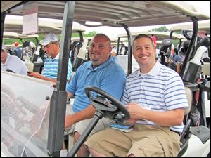 Heartbeat Golf Outing. The Clark team: Brian Grime and Jay Stricker.