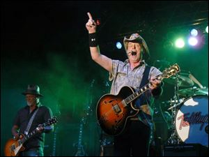 Ted Nugent performs at the 28th Northwest Ohio Rib-Off at the Lucas County Fairgrounds in Maumee  in front of more than 11,000.