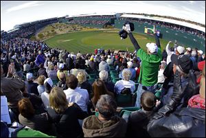 The 16th green of the PGA's Phoenix Open at the Tournament Players Club in Scottsdale, Ariz., is engulfed by skyboxes and bleachers and can hold up to 20,000 fans.