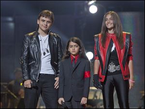 From left, Prince Jackson, Prince Michael II 