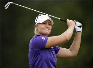 Anna Nordqvist, of Sweden, watches her tee shot on the third hole in the final round of the LPGA Classic golf tournament in Waterloo, Ontario.