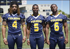 From left, Jordan Haden, Chris Dukes, and Byron Best are hoping to play this season for the Rockets. Dukes and Best are listed as cornerback starters.