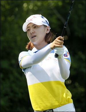 Farr Classic defending champion Na Yeon Choi hits a tee shot Tuesday at Highland Meadows during a celebrity pro-am. 