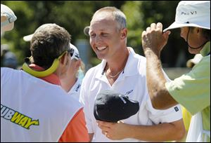 UT golf coach Jamie Broce teamed with Brittany Lincicome to win the Celebrity Pro/Challenge at Highland Meadows.