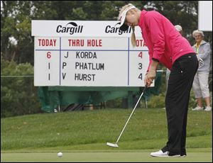 Jessica Korda, the daughter of former pro tennis player Petr Korda, fired the day's low score with a 6-under 65 on Friday that put her five strokes off the lead at the midway point of the Jamie Farr Toledo Classic in Sylvania.