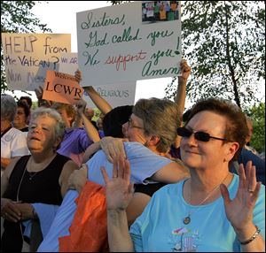 Supporters of the largest group for American nuns, the Leadership Conference of Women Religious, hold a vigil for them in St. Louis this week. The Vatican has rebuked the nuns, ordering them to reform.