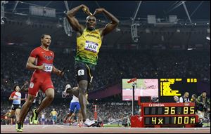 Usain Bolt anchored Jamaica's 4x100-meter relay team Saturday in London. Jamaica won in a world-record 36.84 seconds.