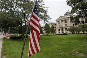 American flags surround Lucas County courthouse Tuesday in remembrance of of VJ Day.