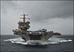 The aircraft carrier USS Enterprise is under way March 19 as part of Enterprise Carrier Strike Group to support maritime security operations and theater security cooperation efforts in the U.S. 6th Fleet area of responsibility.