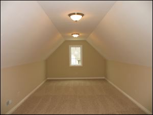 This large “bonus” room offers homeowners additional space for hobbies or entertainment.