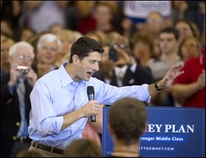 U.S. Rep. Paul Ryan, tapped by Mitt Romney, the presumptive Republican nominee for president, rips into President Obama's record during a campaign stop at Walsh University in North Canton, Ohio.