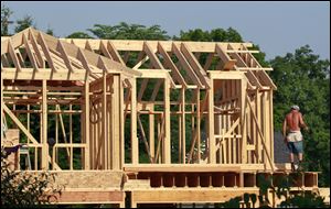 The Commerce Department said single-family homes and apartments started in July fell 1.1 percent to a seasonally adjusted annual rate of 746,000. But applications for building permits rose 6.8 percent.