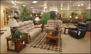 Furniture maker La-Z-Boy is considering moving its operations away from Monroe, Mich.