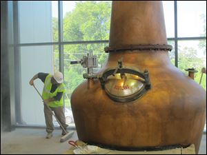 Kentucky's bourbon sector shows off a copper still that will make Town Branch bourbon at a $6 million distillery being built by Alltech's Lexington Brewing & Distilling Co. in Lexington.