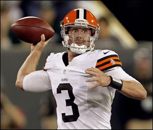 Cleveland Browns quarterback Brandon Weeden throws during the first half of a preseason NFL football game against the Green Bay Packers Thursday.