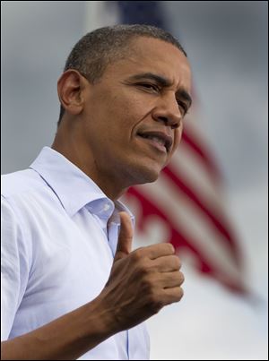 President Barack Obama speaks during a campaign event, Saturday in Rochester, N.H., at Rochester Commons.