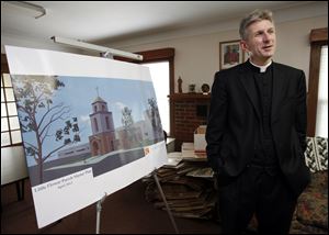 The Rev. David Nuss, pastor of Little Flower of Jesus Catholic Church, says the addition of a three-story tower will increase the growing parish and school's visibility along heavily traveled Dorr Street.