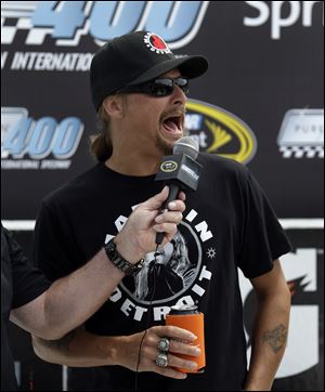 Kid Rock gives the command to start the drivers' engines before the NASCAR Sprint Cup Pure Michigan 400 auto raceat Michigan International Speedway, Sunday.
