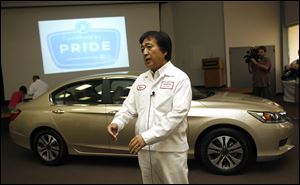 Hide Iwata, president and chief executive officer of Honda of America Manufacturing, speaks to reporters at Honda's Marysville, Ohio, plant about the new model that is to go on sale next month. He said Monday that the Accord remains the industry benchmark in its segment.