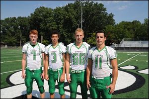 Ottawa Hills captains, from left, Cole Ferguson, Jonathan Rodriguez, Matt Knetchel-Bernath, and Will Longthorne.
