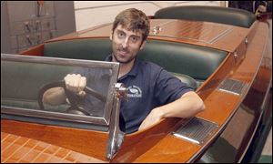 Scott Ramsey, above, and his brothers, Dave and Chris, restore boats at their Toledo shop.