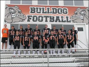 SUMMERFIELD SENIORS, FROM LEFT:
Row 1: Jake Ogle, Zach Collins, Brad Sweeney, Blane Kottke, Shiloh Robinson, Spike Cress, Skyler Krueger
Row 2: Derrick Garner, manager; Mike Phillips, Andrew Cilley, Lucas Diver, Dakota Ladd, Taylor Wentworth, Caleb Krueger, Jordan Link, Steve Schankin