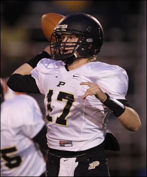 Perrysburg's Steve Slocum, a dual threat at QB, returns for his third season. He threw for 1,535 yards and 16 touchdowns and added 509 rushing yards and six TDs.
