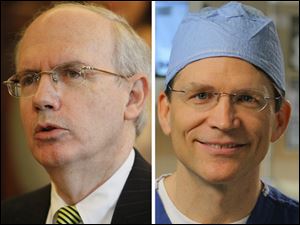 Dr. Jeffrey Gold, left, says the university apologizes for the 'unfortunate incident.' Dr. Michael Rees, right, is the surgeon who removed the kidney before it was ruined.