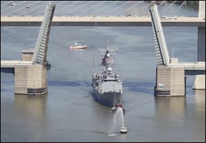The USS De Wert, a guided-missile frigate, is one of the five navy vessels that arrived in Toledo Harbor Thursday for Navy Week. Free tours of the De Wert will be offered today, Saturday, and Sunday.