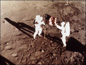 In this July 20, 1969 file photo, Apollo 11 astronauts Neil Armstrong and Edwin E. 