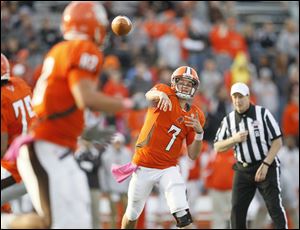 Bowling Green State University quarterback Matt Schilz, 7, throws a pass last season. This season, measuring the junior signal-callers improvement will be a more subtle thing. He may throw for fewer yards, and he may collect fewer touchdowns, but that doesn't necessarily mean he hasn't improved.