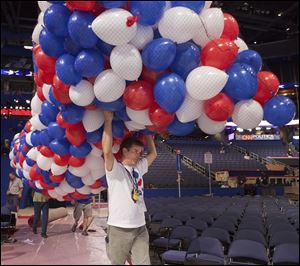 Balloons are carried across the convention floor as preparations continue for the Republican National Convention in Tampa last week. 