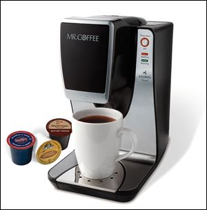 A Mr. Coffee sing-serving brewing machine.