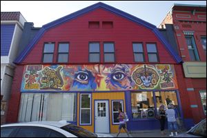 Mario Torero has painted his trademark 'Picasso's Eyes' in Lima, Peru; San Diego; and above the door of Joe Martinez's studio on Broadway.