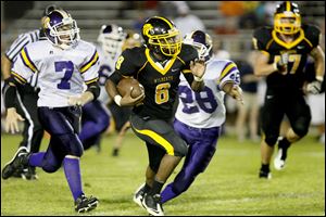 Northview's Corey Bowman breaks away from the Waite defense in the third quarter. Bowman rushed for 106 yards.