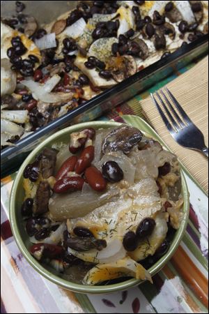 Baked mushroom and eggplant with beans and onions.