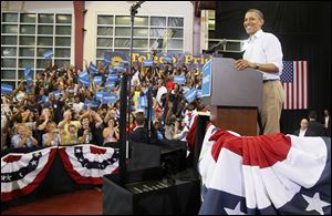 President Barack Obama campaigns at Scott High School in Toledo.