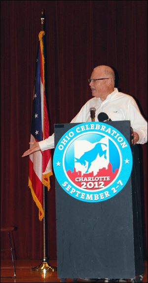 Union leader Lee Saunders, a Cleveland native, entertains Ohio delegates at a breakfast meeting.