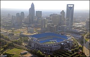 The skyline of Charlotte, N.C., rises behind Bank of America Stadium, the open-air football stadium where President Obama had hoped to give his convention address.