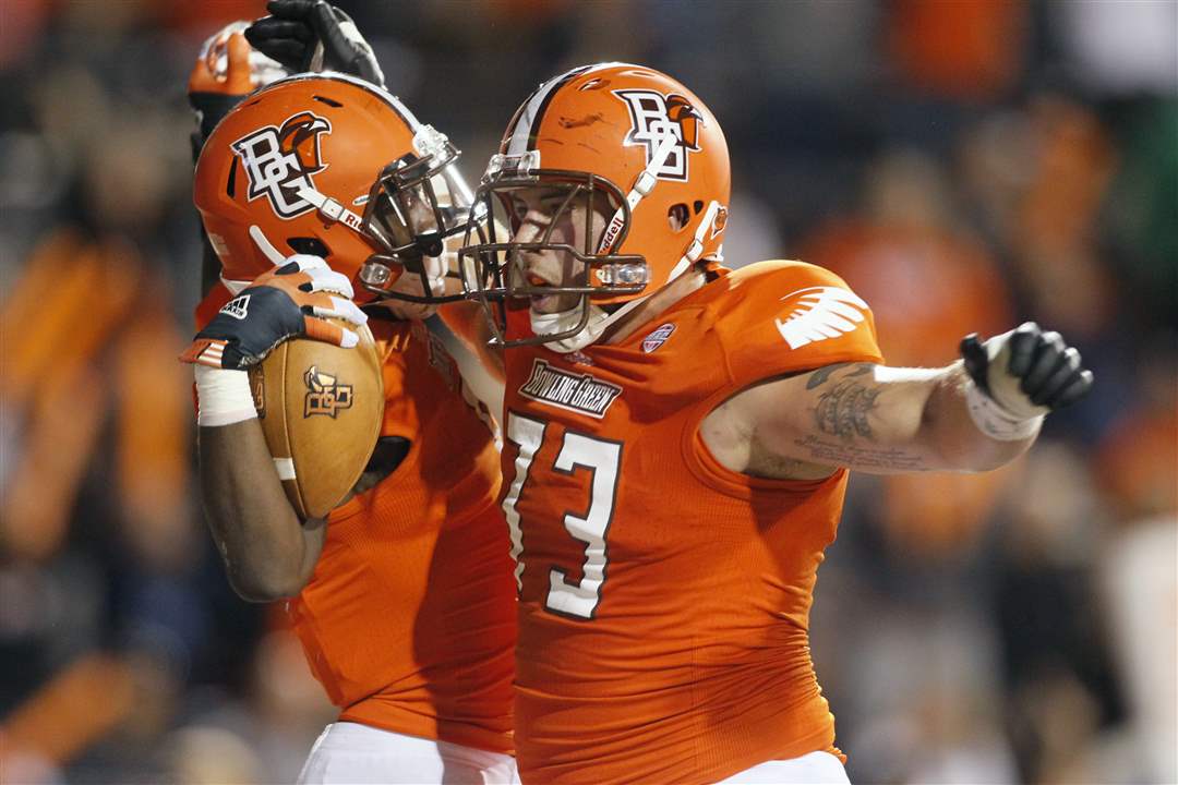 Bowling-Green-s-Anthon-Samuel-left-celebrates-with-teammate