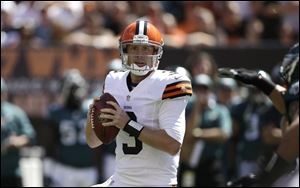Browns quarterback Brandon Weeden threw four interceptions in his pro debut. He finished with 118 yards passing.