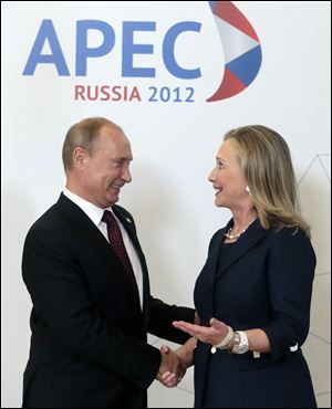 Russian President Vladimir Putin and Hillary Clinton meet at the APEC meeting in Vladivostok.