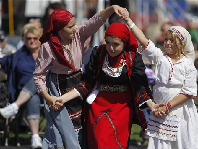 Olympians dancers Claire Petas, left, Sophia Yakumithis Olympians dancers Claire Petas, left, Sophia Yakumithis and Claudia Mancy dance at the annual Greek-American Festival. They performed Saturday, the second day of the event at the Holy Trinity Greek Orthodox Cathedral near downtown Toledo.